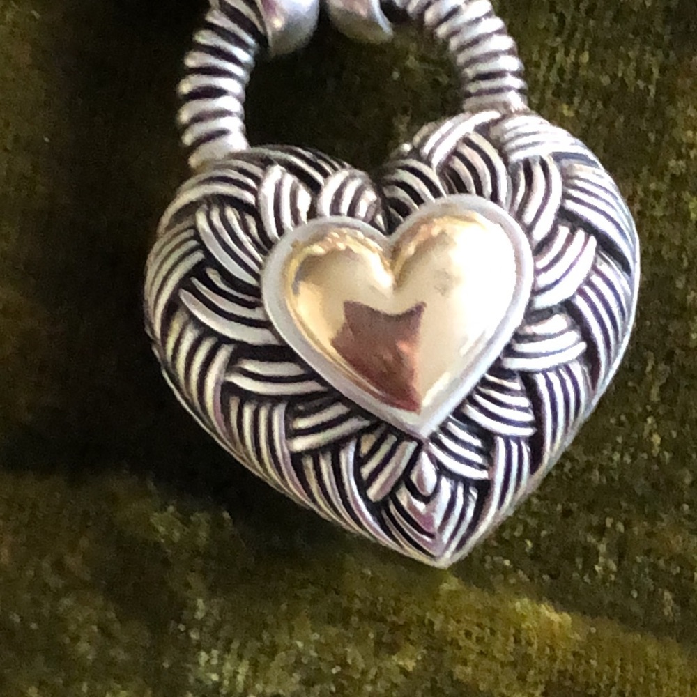 Andrea Candella Sterling and 14k gold large heart necklace.